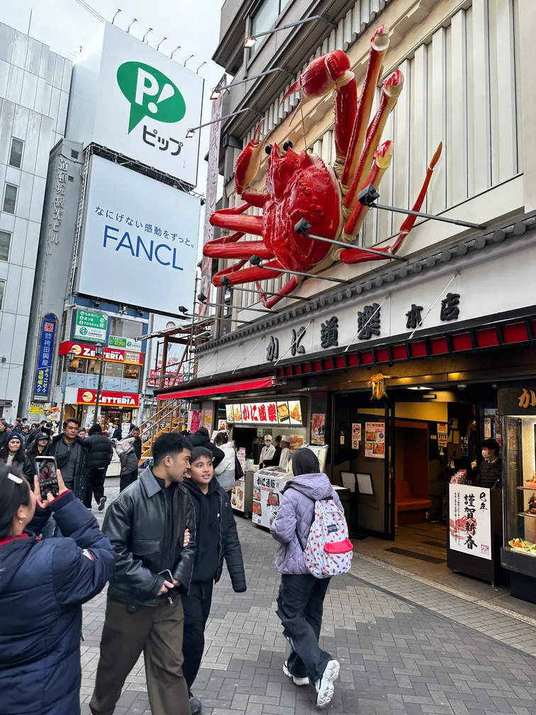 A giant crab sign above a shop in Shinsaibashi