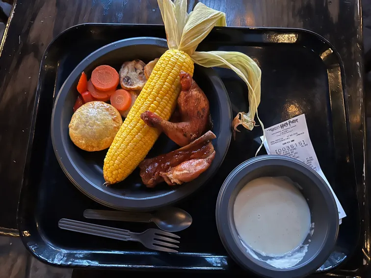 A British dinner with chicken, corn, and soup at the Harry Potter-themed restaurant
